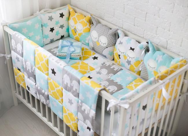 Бортики на кроватке