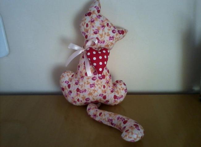 Вариант сидящего котика